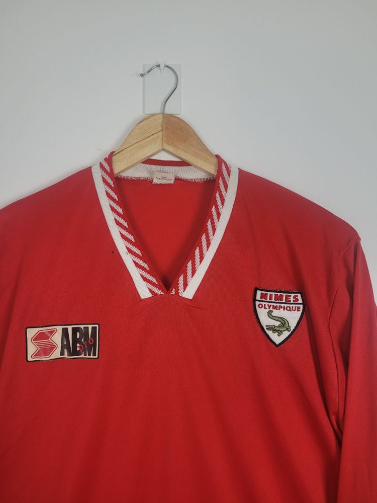 
                  
                    Original Nîmes Olympique Training Jersey 1992-1993 - XL
                  
                