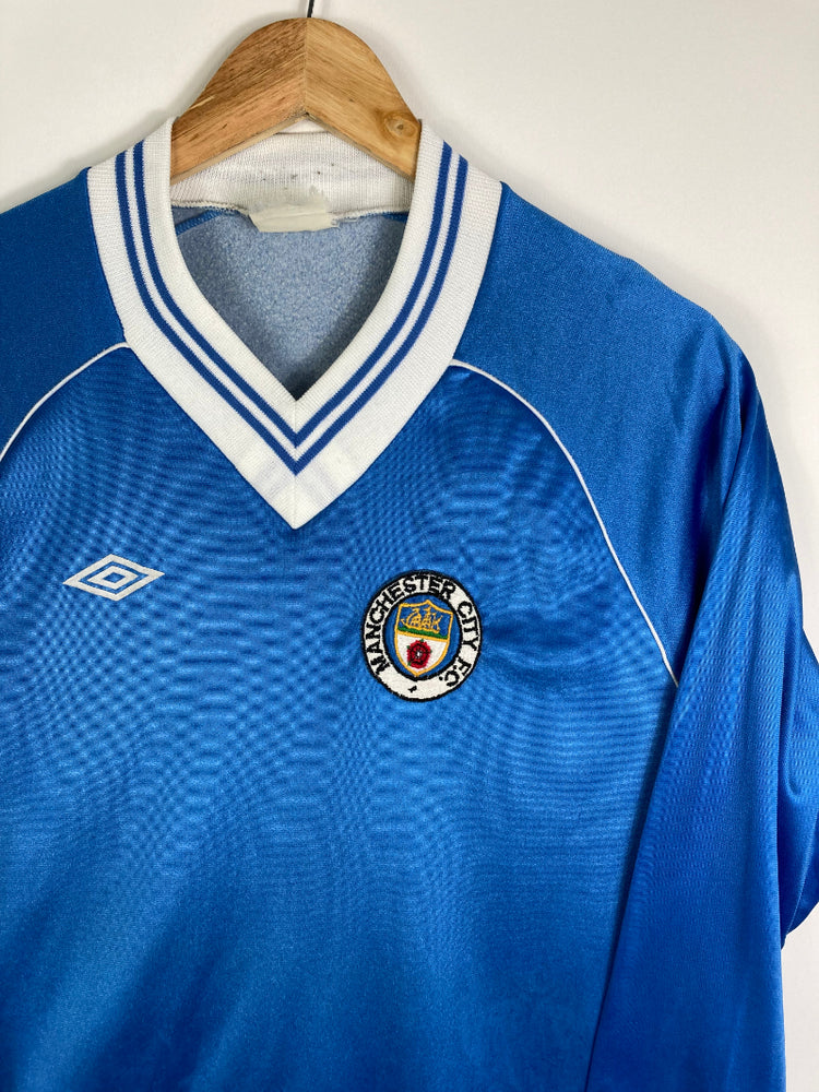 
                  
                    Original Manchester City Home Jersey 1981-1983 - L
                  
                